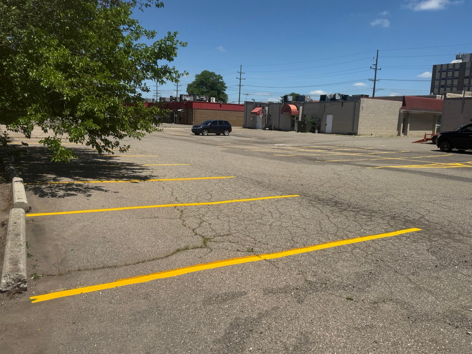 Fresh yellow parking lot striping